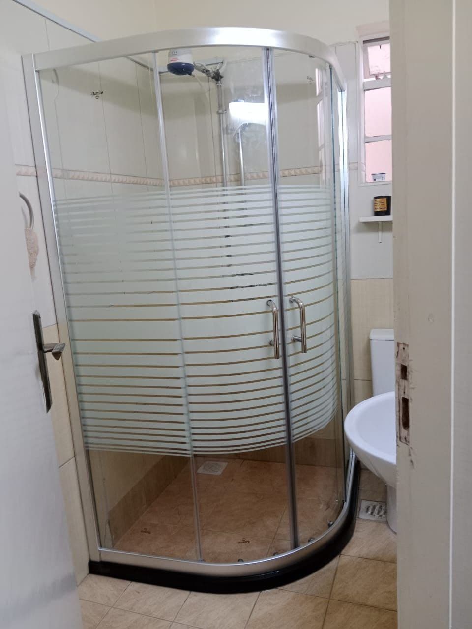 Quadrant Double Door Shower Cubicle Installation in Mombasa | Shower Door